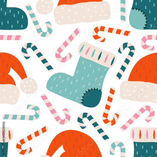 Merry Christmas and happy new year seamless pattern. Festive background with Christmas knitted sock, Santa Claus hat, candy cane, sweets. Xmas holiday vector illustration in Scandinavian style.
