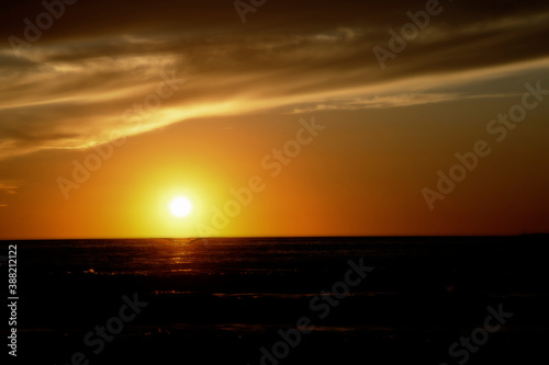 Fototapeta Naklejka Na Ścianę i Meble -  Beautiful sunset over the sea during summertime