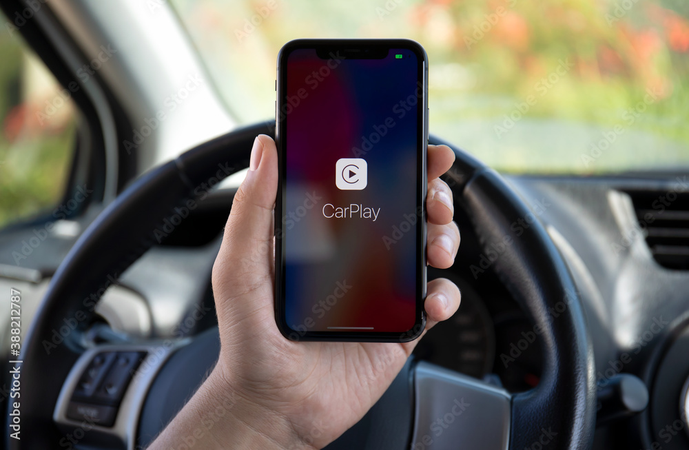 Woman hands holding Apple iPhone 11 with CarPlay in screen Photos | Adobe  Stock