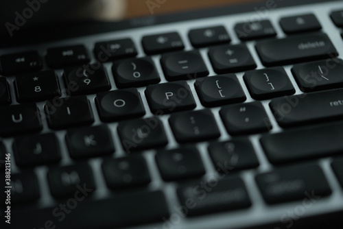 A close up of a computer keyboard. High quality photo