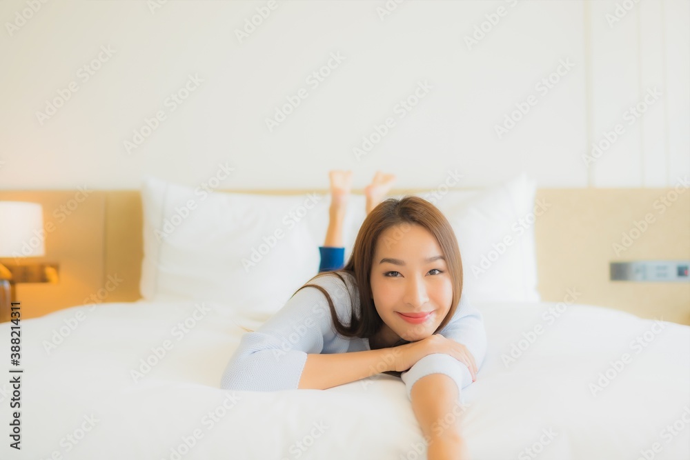 Portrait beautiful young asian woman smile relax leisure on bed Portrait beautiful young asian woman smile relax leisure on bed