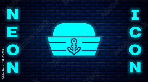 Glowing neon Sailor hat icon isolated on brick wall background. Vector.