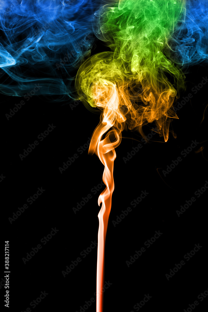 Abstract color smoke swirls on a black background. Abstract color smoke swirls on a black background.