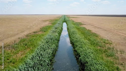 Agricultural Irrigation Canal in Rural Farming Area or desert