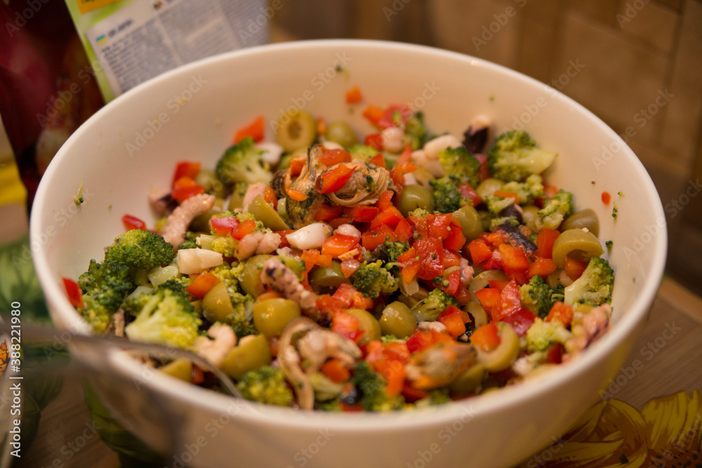 salad with seafood and vegetables on a home table salad with seafood and vegetables on a home table