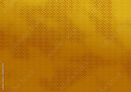 和紙テクスチャの金色グラデーションの紗綾形和柄パターン背景
