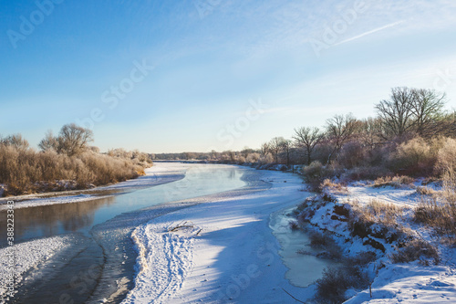 Fototapeta Naklejka Na Ścianę i Meble -  Freezing river. The beginning of winter, Russia