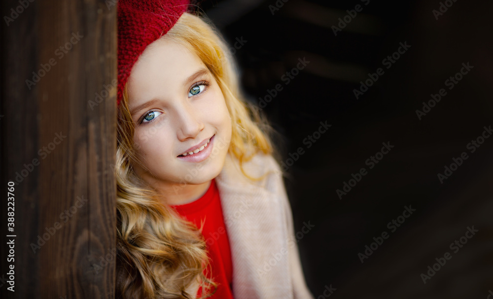 Cute little girl in red beret in autumn Cute little girl in red beret in autumn