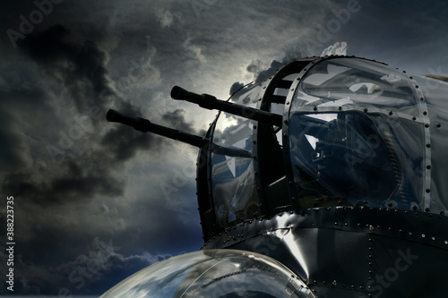 Fototapete nose gun turret on British Avro Lancaster bomber of world war two with added sky