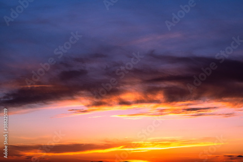 Backgrounds and textures. Beautiful and dramatic colorful sky with clouds at sunset. Sky texture. Abstract nature background. © PhotoGranary