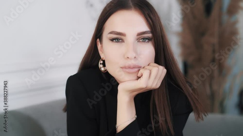 Close-up portrait of beautiful successful young caucasian businesswoman