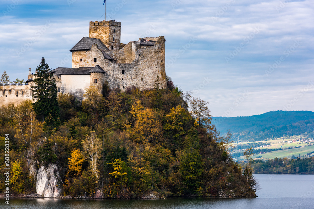 Niedzica Mediaval Castle on Czorsztyn Reservoir and Dunajec River. Polish Landscape and Heritage in Autum Colors.