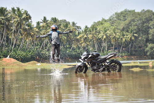 biker on a motorcycle in water