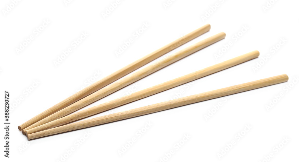 Asian wooden chopsticks for eating isolated on white background Asian wooden chopsticks for eating isolated on white background