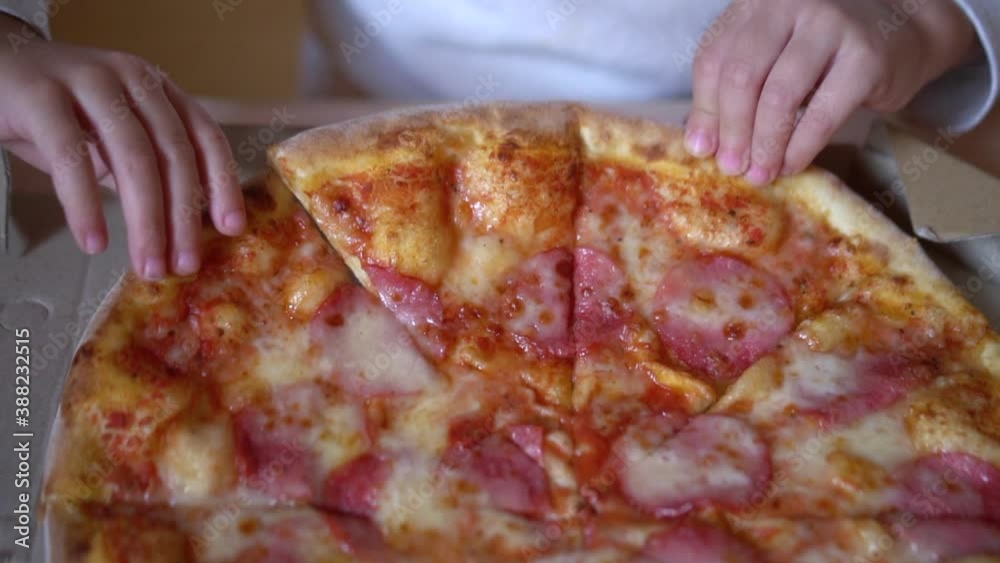 Little girl aged five eating.