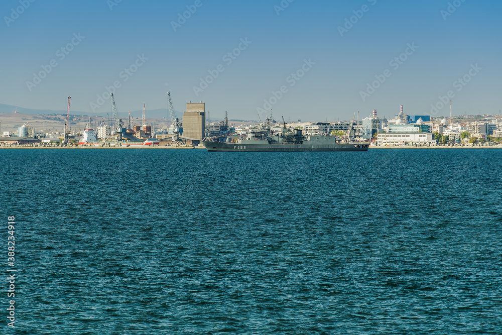 Greek frigate Hydra warship at sea. Hydra-class flagship of the Hellenic Navy moored outside the city port, during a national holiday in Thessaloniki, Greece.