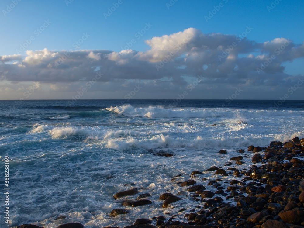 Atlantic ocean shore with waves and clouds at Gran Canaria, Canary Islands, Spain (no people) Atlantic ocean shore with waves and clouds at Gran Canaria, Canary Islands, Spain (no people)