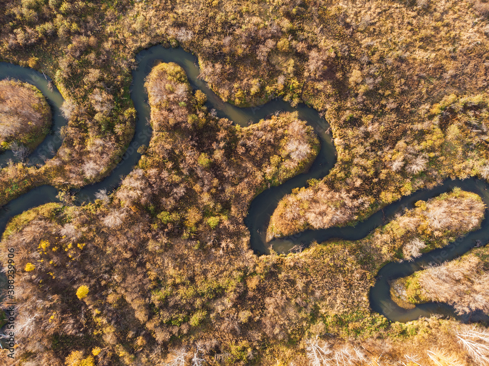 Aerial drone view of autumn landscape with river. Aerial drone view of autumn landscape with river.