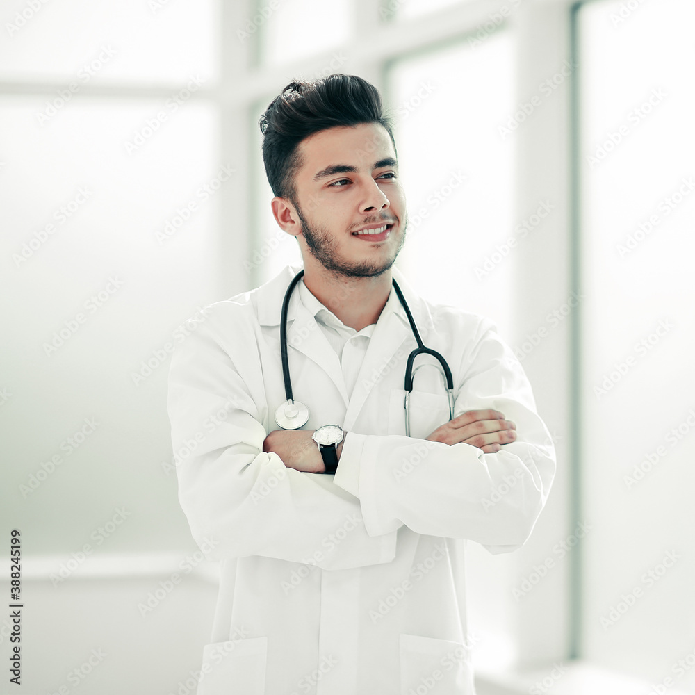 portrait of a physician therapist on a light background portrait of a physician therapist on a light background
