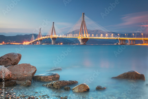 Fototapeta Naklejka Na Ścianę i Meble -  Modern Bridge at the evening night time with illuminations. Rion-Antirion Bridge