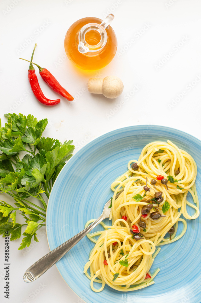 linguine made with garlic, oregano, capers, olives, lemon peel