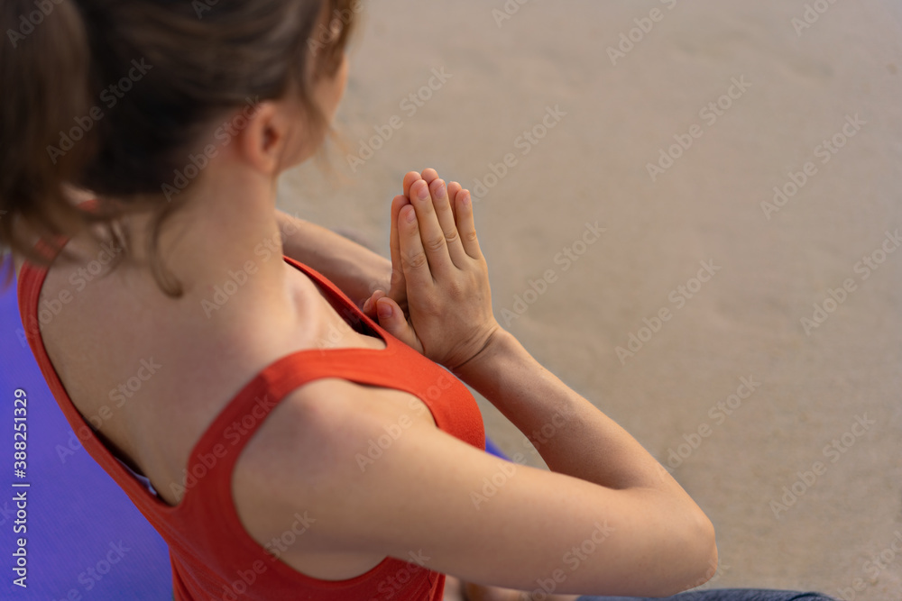 Doing yoga exercise,