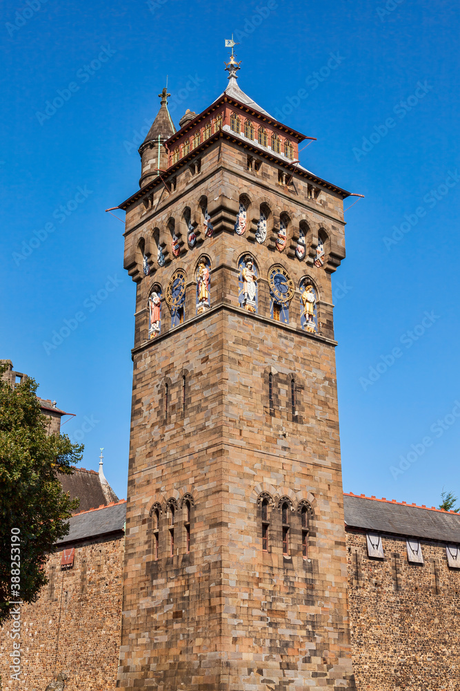 The clock tower of Cardiff Castle Wales UK completed in 1873 which is part of the wall of the 12th century Norman fort which is a popular tourism travel destination attraction landmark of the city