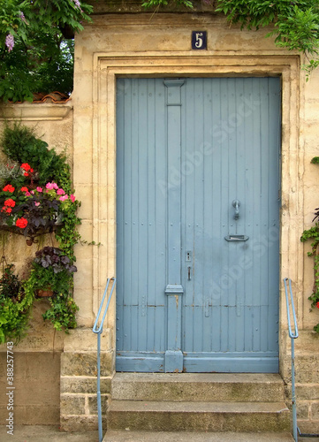 Wooden door in a traditional facade - Portugal