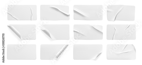 White glued crumpled stickers with curled corners isolated on white background. Adhesive paper or plastic sticker label with wrinkled and creased effect. Template label tags close up. 3d vector
