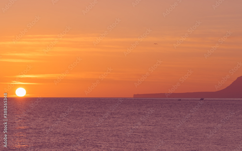 Fototapeta premium Sunrise over sea