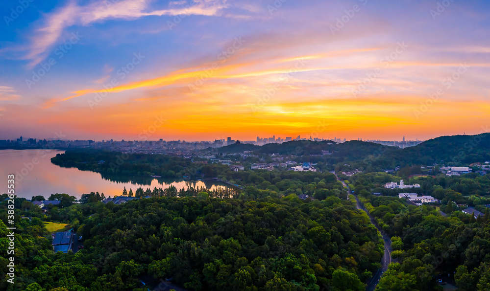 Beautiful West Lake and city skyline in Hangzhou at sunrise,China.aerial view.