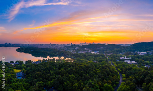 Beautiful West Lake and city skyline in Hangzhou at sunrise China.aerial view.