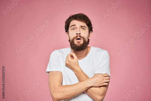 cheerful bearded man white t-shirt emotions cropped view pink background