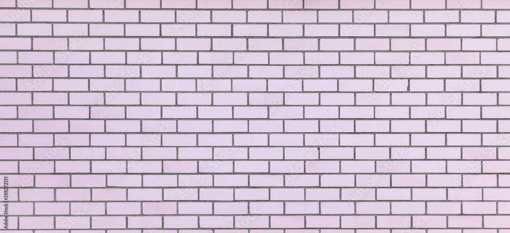Wide light pink brick wall texture. New clean masonry. Panoramic view. Bricks background. Banner Wide light pink brick wall texture. New clean masonry. Panoramic view. Bricks background. Banner