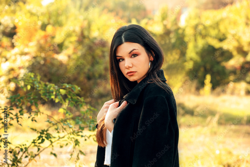 autumn portrait of attractive brunette in the park outdoor autumn portrait of attractive brunette in the park outdoor
