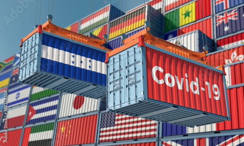 Container with Coronavirus Covid-19 text on the side and container with Honduras Flag. 3D Rendering © Marius Faust