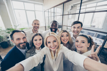 Photo of positive man woman business sharks have crisis company growth plan briefing online blogging make selfie wear formal outfit in workplace workstation