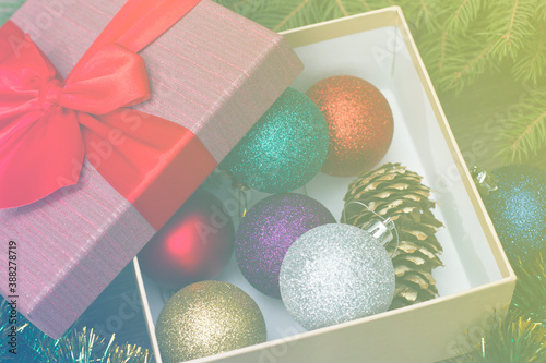 open gift box with christmas decorations