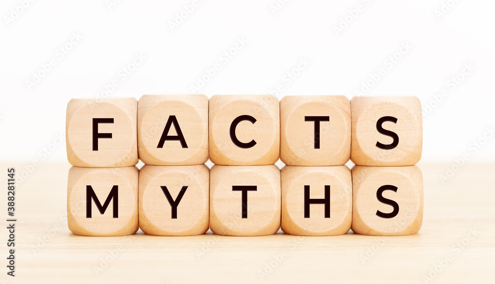 Facts Myths concept. Wooden blocks with text on table Facts Myths concept. Wooden blocks with text on table