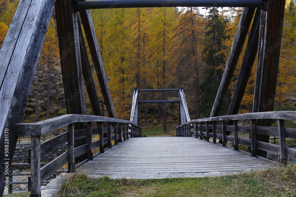Autumn in the mountains. Champorcher Valley,Alps,Italy. Bridge over the river.