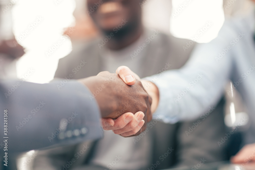 close up. handshake of business people on a blurry background.
