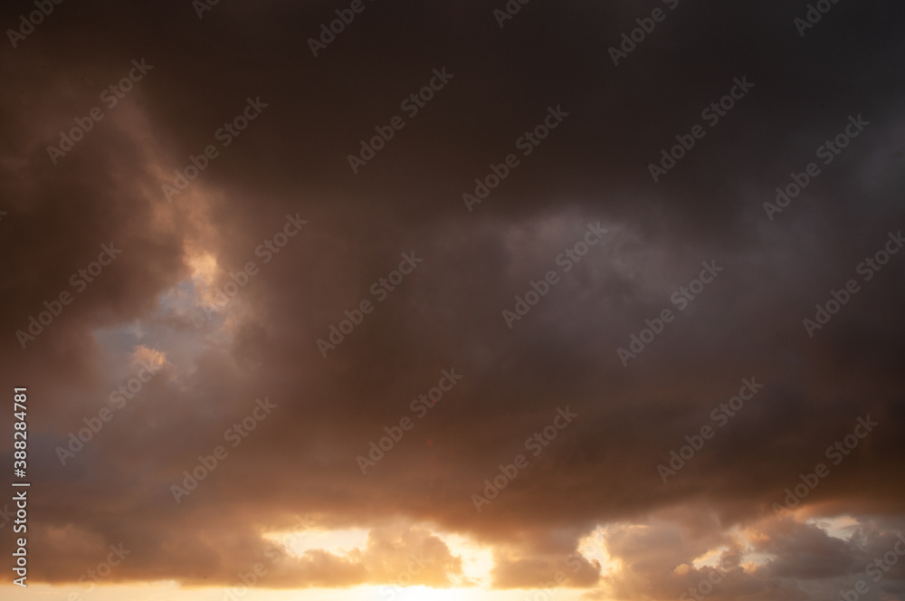 Close-up of Dark clouds at sunset. Background cloudscape