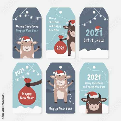 Christmas tags and labels for gifts in 2021 new year. Vector cute set of cards for printing in blue colors with a bull, the symbol of the year
