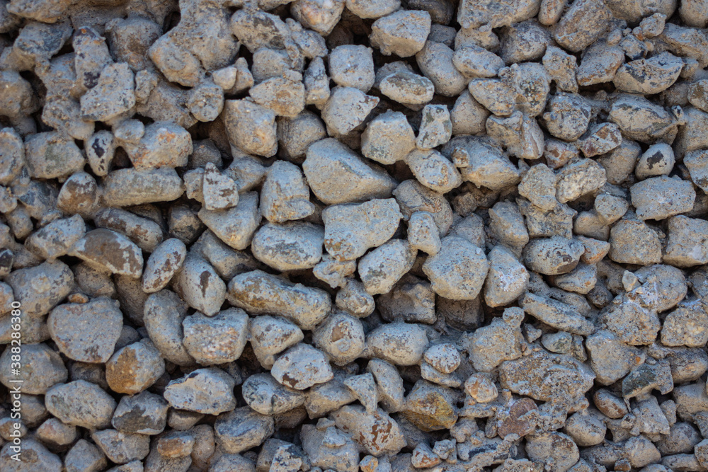 Concrete texture with large and small stones. Background Concrete texture with large and small stones. Background