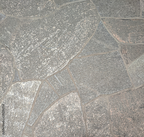 the texture of the floor made of natural grey stone