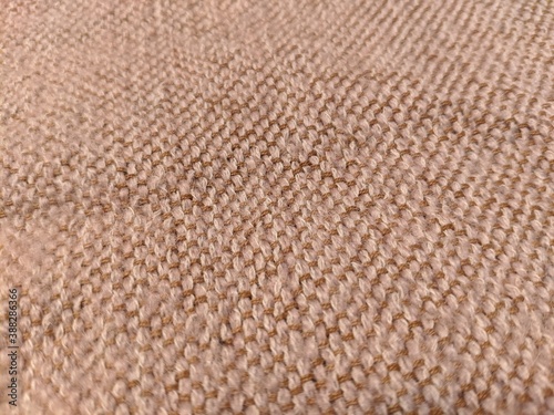 the texture of the beige linen fabric with natural