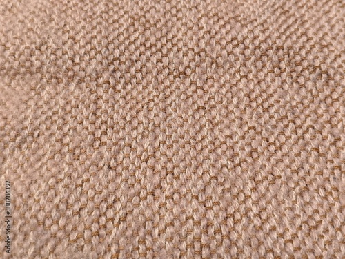 the texture of the beige linen fabric with natural