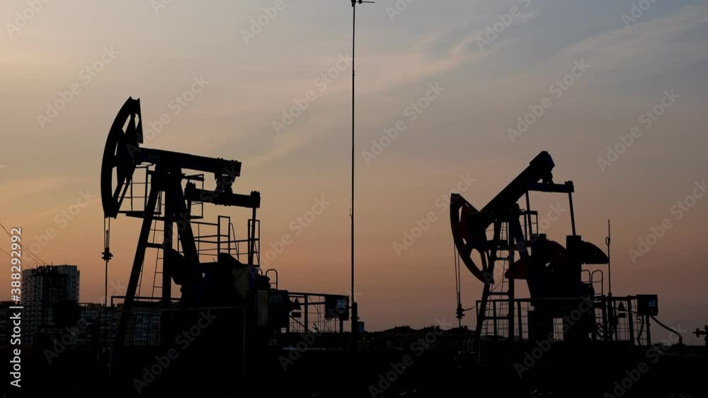 Oil drill rig and pump jack. Petroleum production, natural gas. Oil drill rig and pump jack. Petroleum production, natural gas.