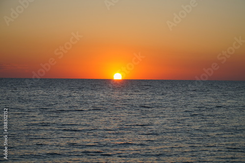 The sun rises over the Sea of Azov.