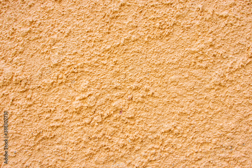 Orange concrete wall texture for background and construction
